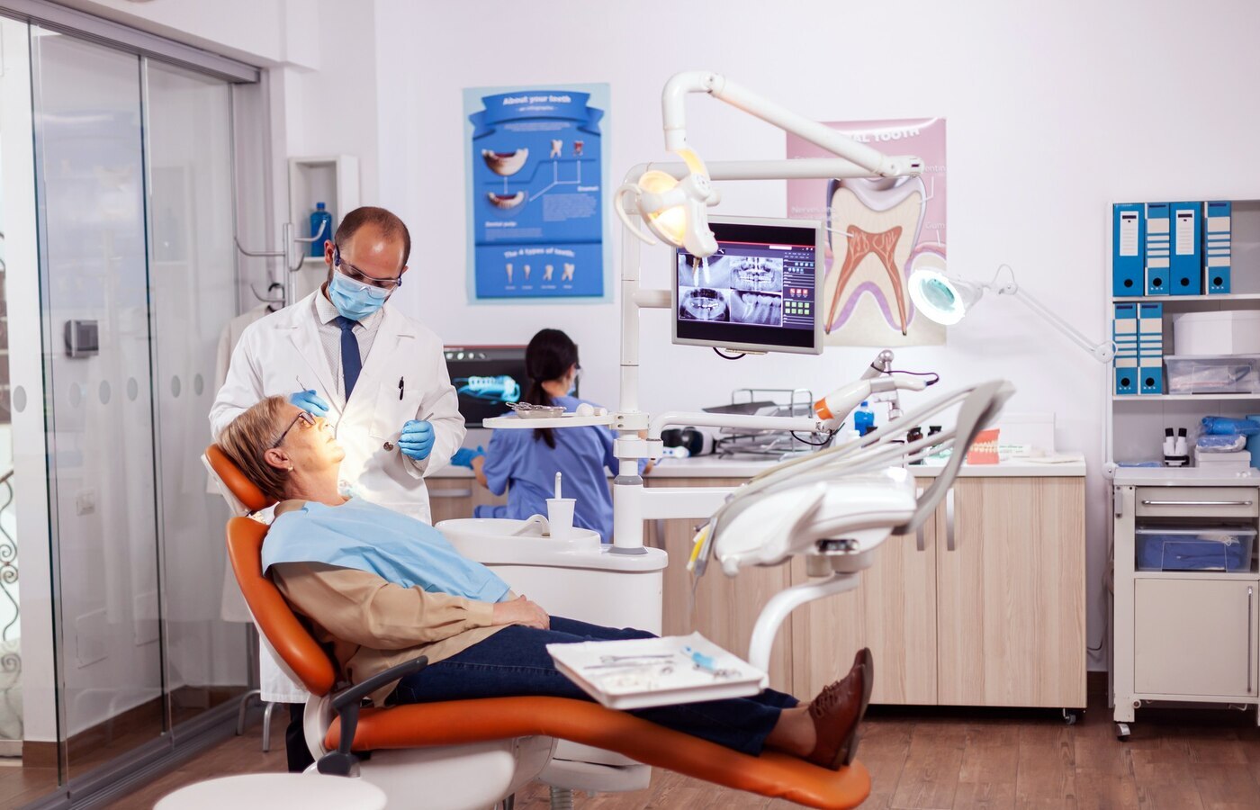 dentist-doing-dental-treatment-intervention-senior-woman-elderly-patient-medical (1)