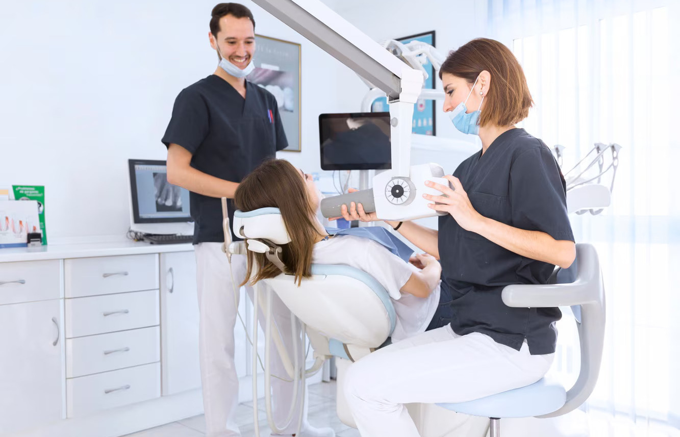 female-dentist-scanning-patient-s-teeth (1)
