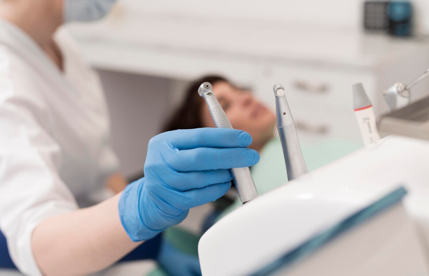 female-patient-having-procedure-done-dentist (1)